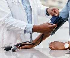 Orange_Medical_Care_Addiction_Medicine_Doctor_Checking_Up_BP