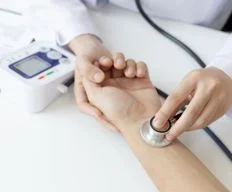 Orange_Medical_Care_Addiction_Medicine_Doctor_Checking_Up_BP